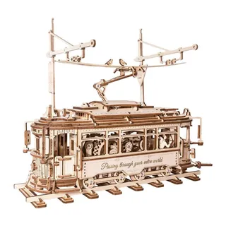 Tramway ancien en bois sur ses rails, caténaire déployée et deux oiseaux perchés dessus