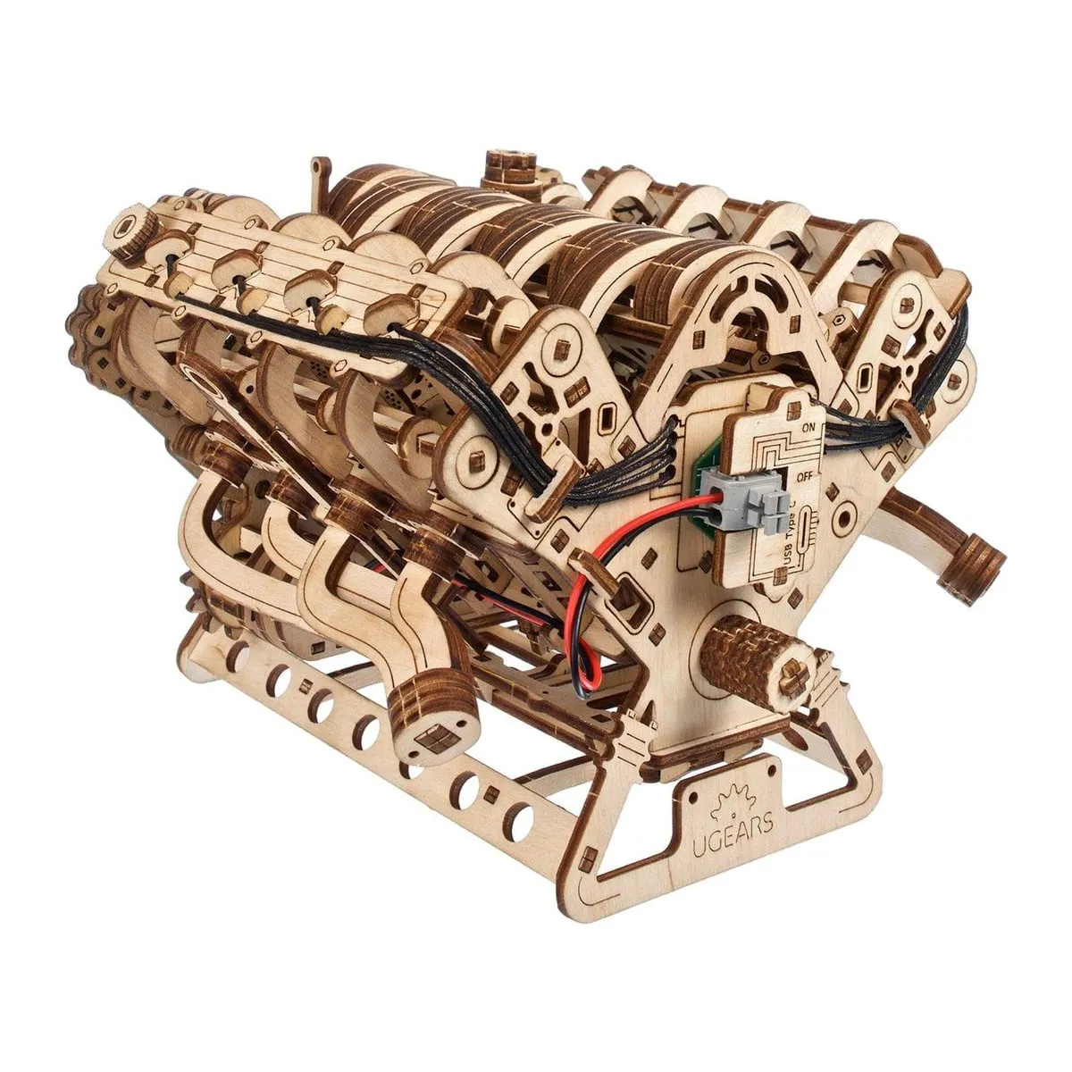 Moteur V8 en bois vu de l'arrière avec ses culbuteurs, son câblage et son interrupteur