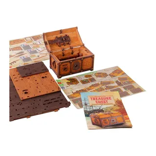 Le contenu de la boîte : planches de pièces imprimées, notice illustrée et coffre monté